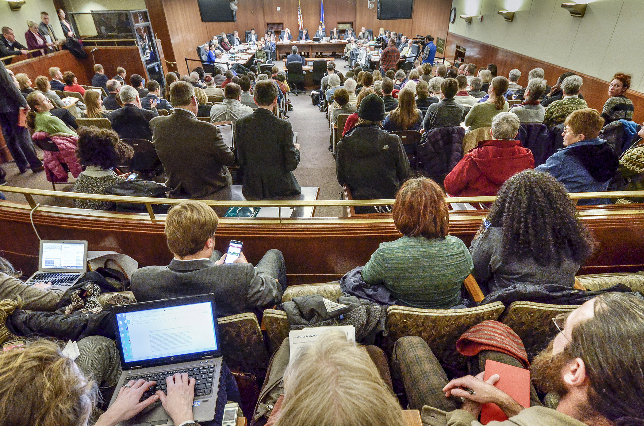 A packed hearing room listens to testimony Feb. 2 on HF600, a bill sponsored by Rep. Pat Garofalo that would prohibit local governments from implementing their own laws regarding private employers. Photo by Andrew VonBank